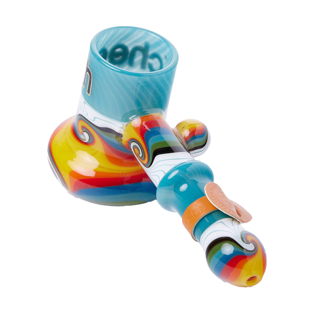 Cheech Glass Wig Wag Bubbler in Blue Red, angled side view on seamless white background