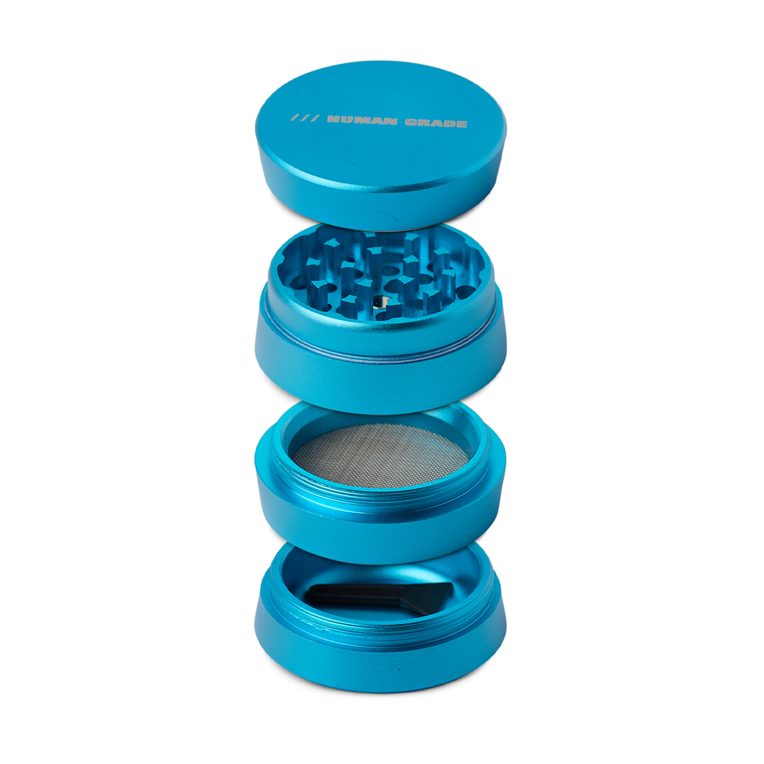 Human Grade Grinder 3A in blue, 2" 4-Piece, front view with open compartments