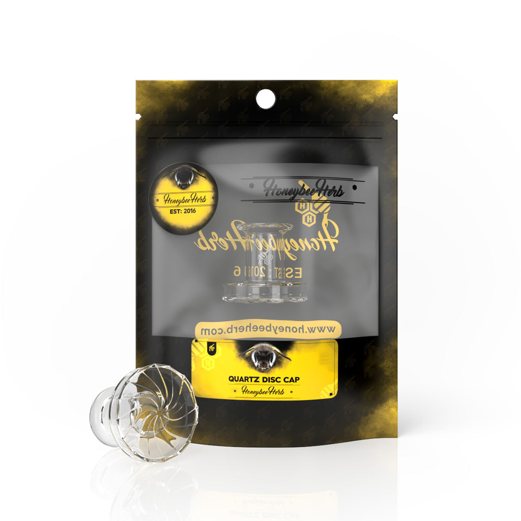 Honeybee Herb Quartz Stamp Carb Cap, clear 30mm, for dab rigs, front view on branded packaging