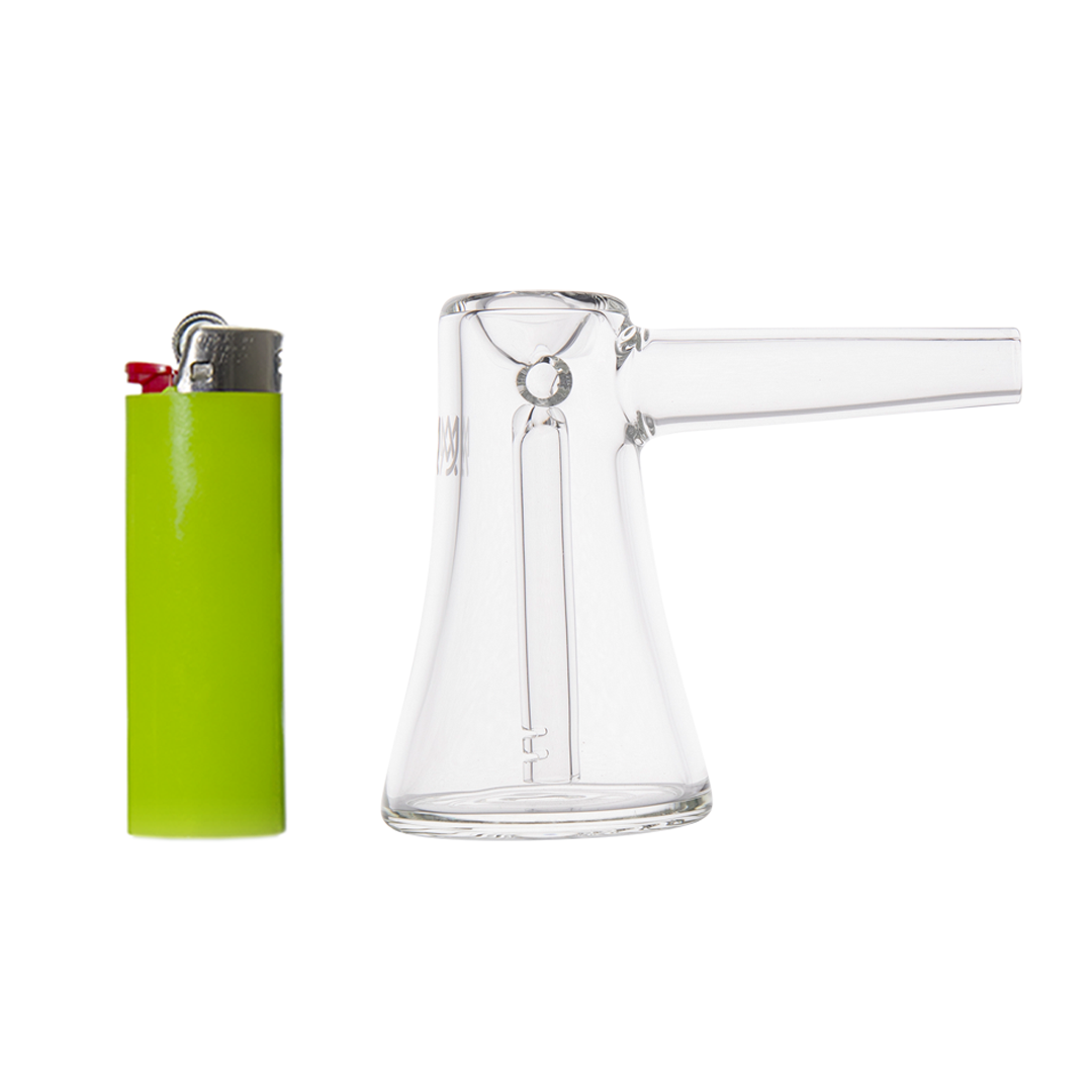 MJ Arsenal Vulkan Bubbler side view with green lighter for scale, compact and clear glass