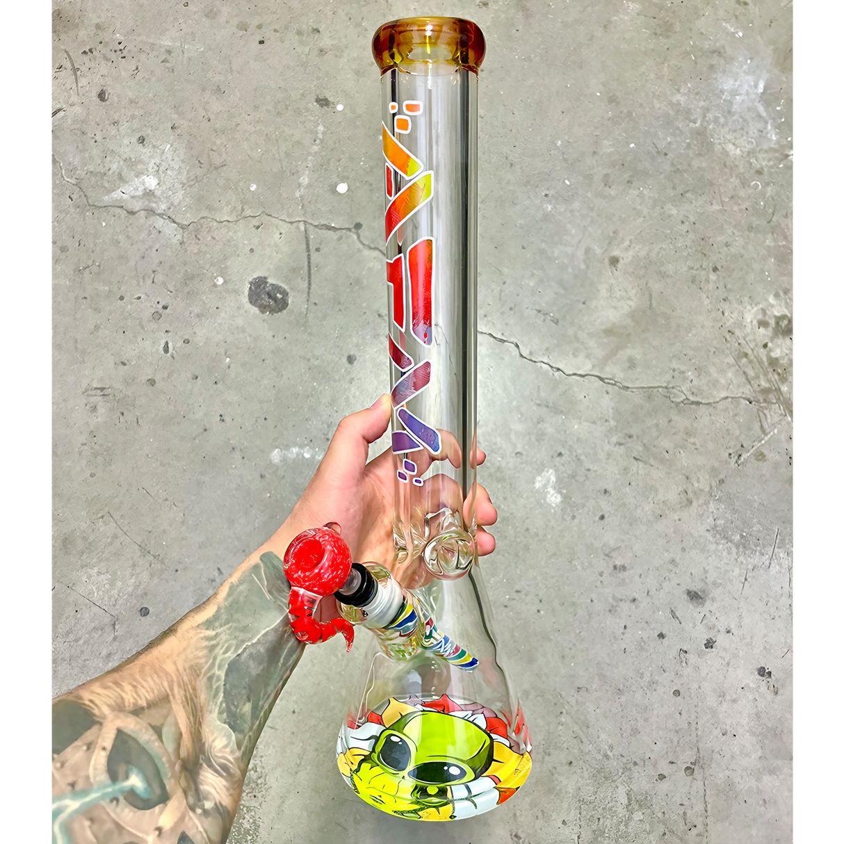 AFM The Color Blast 9mm Beaker Set - 18" held in hand, showcasing vibrant design and heavy wall glass