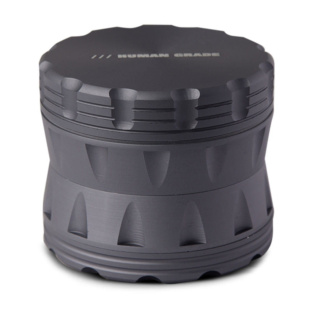 Human Grade Grinder 2A 2.5" 4-Piece in Gunmetal - Angled Front View with Textured Grip