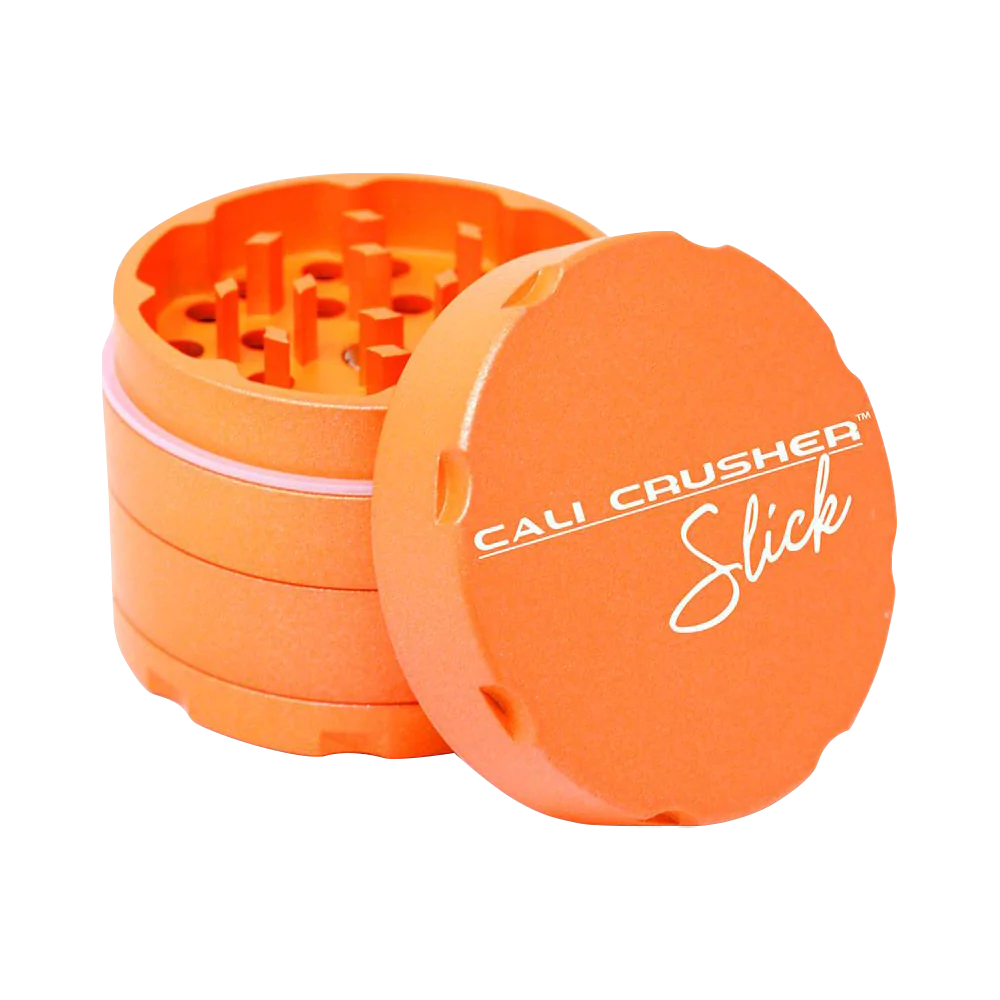 Cali Crusher OG Slick 4-Piece Nonstick Grinder in Orange, Open View Showing Sharp Teeth