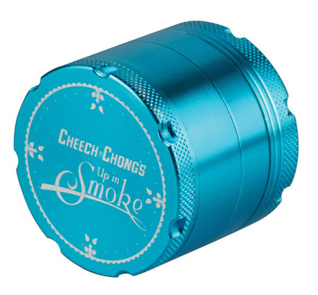 Cheech & Chong's Up In Smoke blue metal 4-part grinder, side view on white background