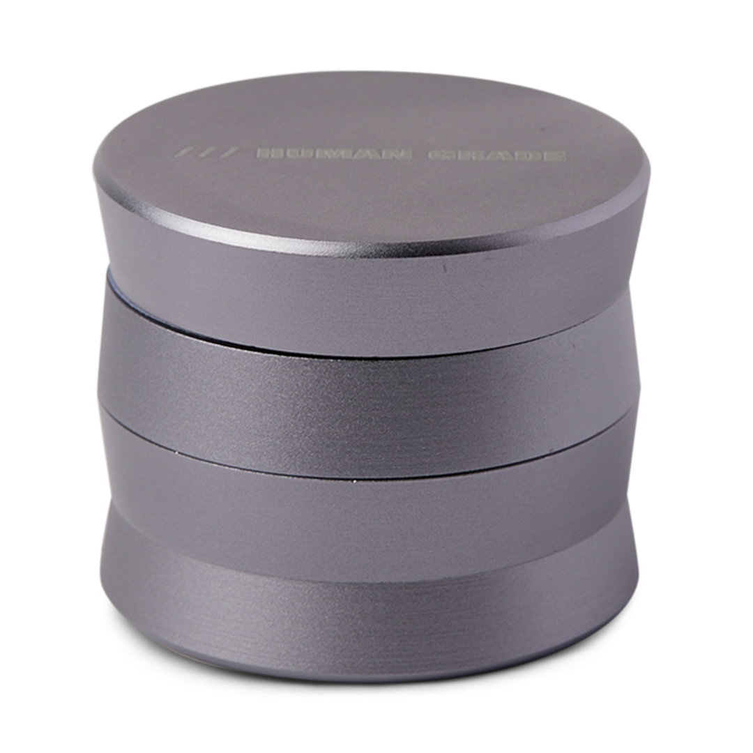 Human Grade Grinder 3A in Gunmetal - 2" 4-Piece Herb Grinder, Front View on White Background