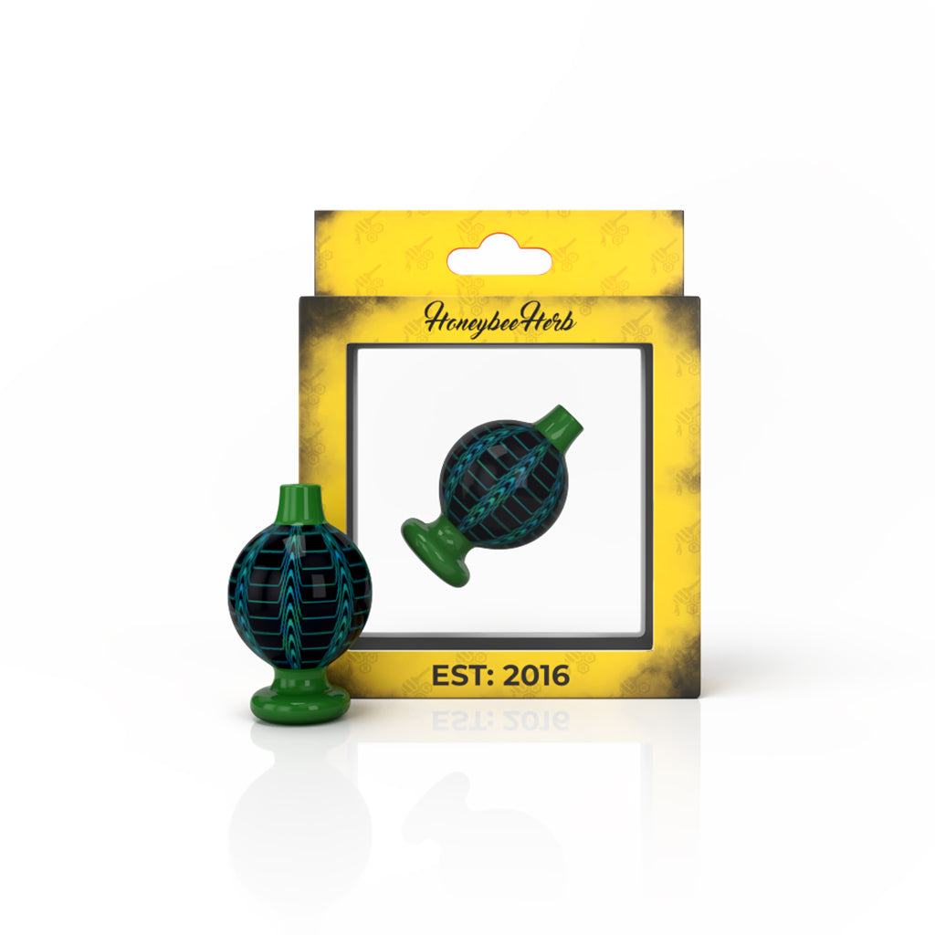 Honeybee Herb Dream Bubble Carb Cap in Dark Green for Dab Rigs, Front View on Packaging