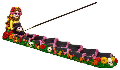 Day of the Dead themed polyresin incense burner with colorful floral design and skeleton figure
