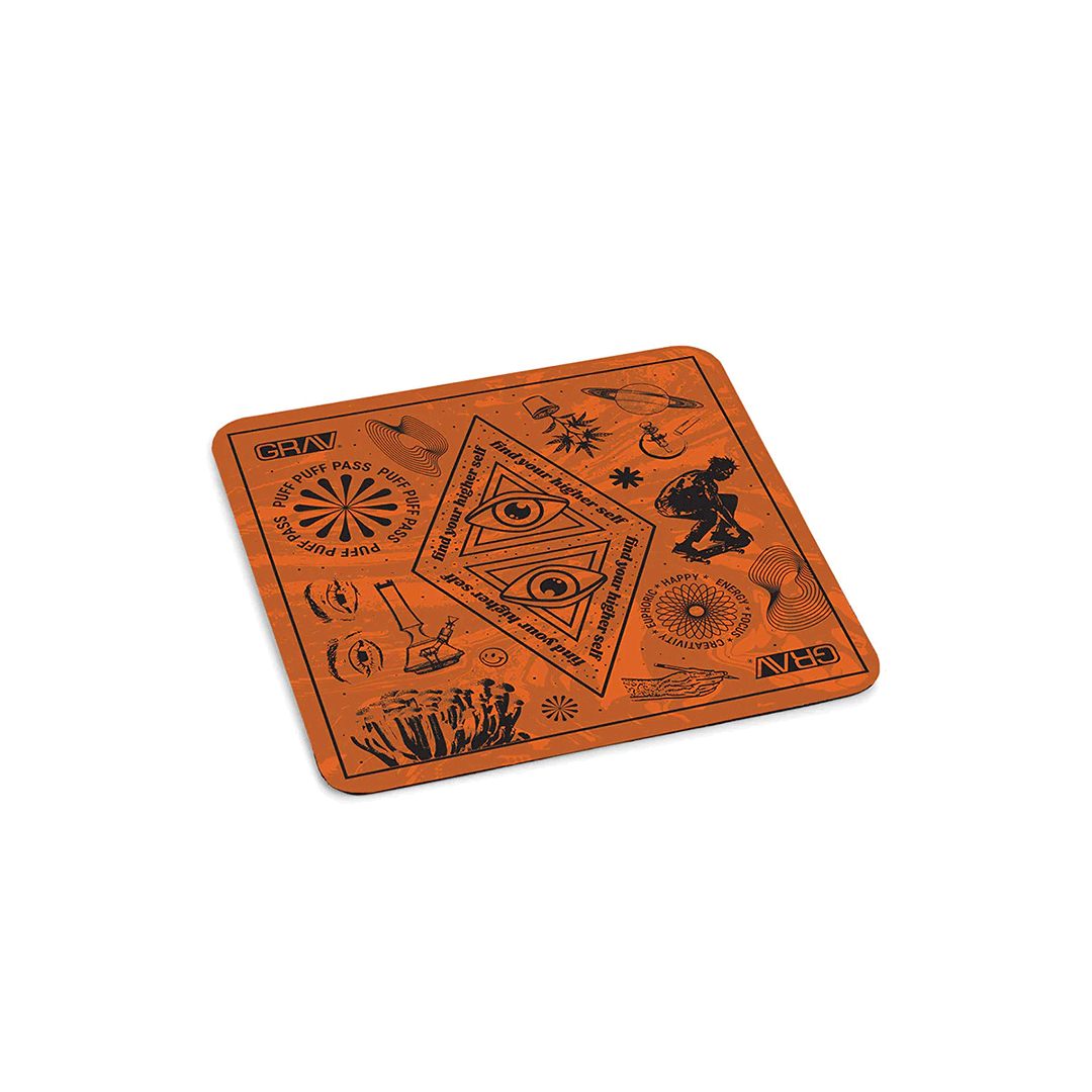 GRAV Dab Starter Kit Bundle with intricately designed orange dab mat, top view on white background