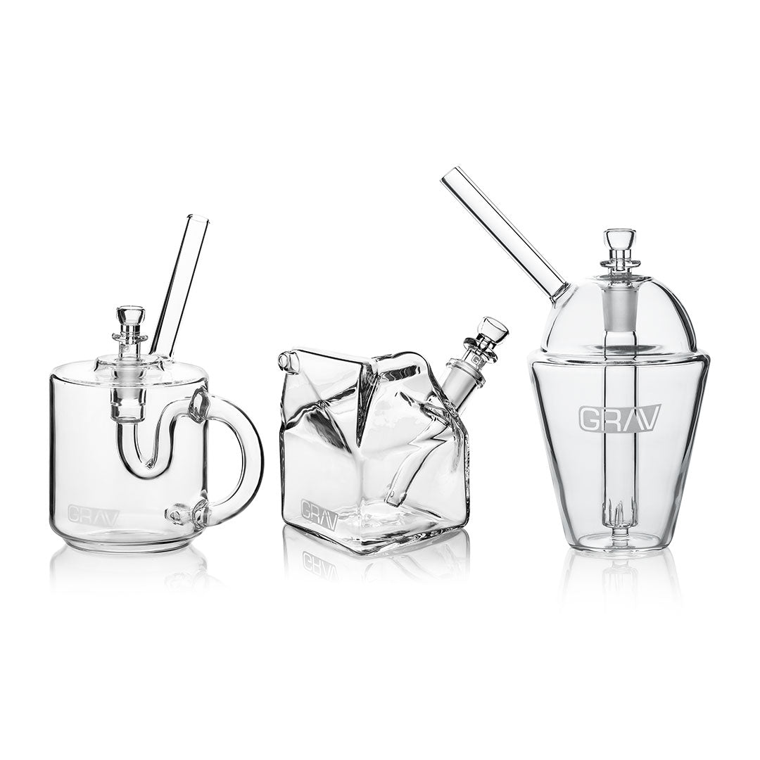 GRAV Sip Series Bundle in clear borosilicate glass, featuring beaker, bubble, and mug pipe designs
