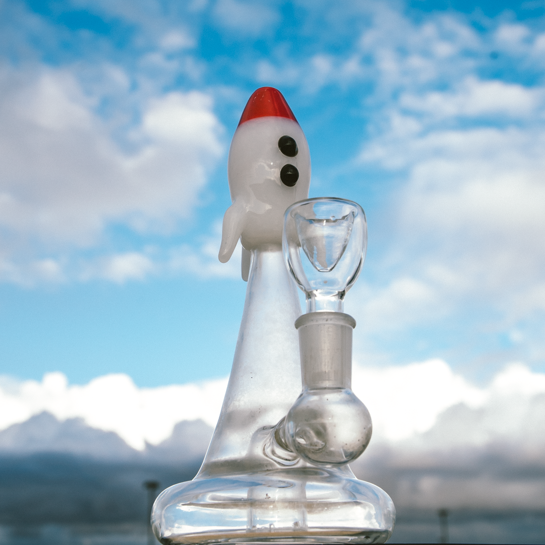 Hemper Blastoff Rocket Bong, 7.5" clear glass with 14mm female joint, front view on sky background