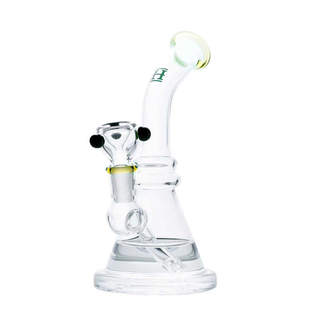 Hemper x Lil Debbie Rig in clear glass with teal accents, angled side view on white background