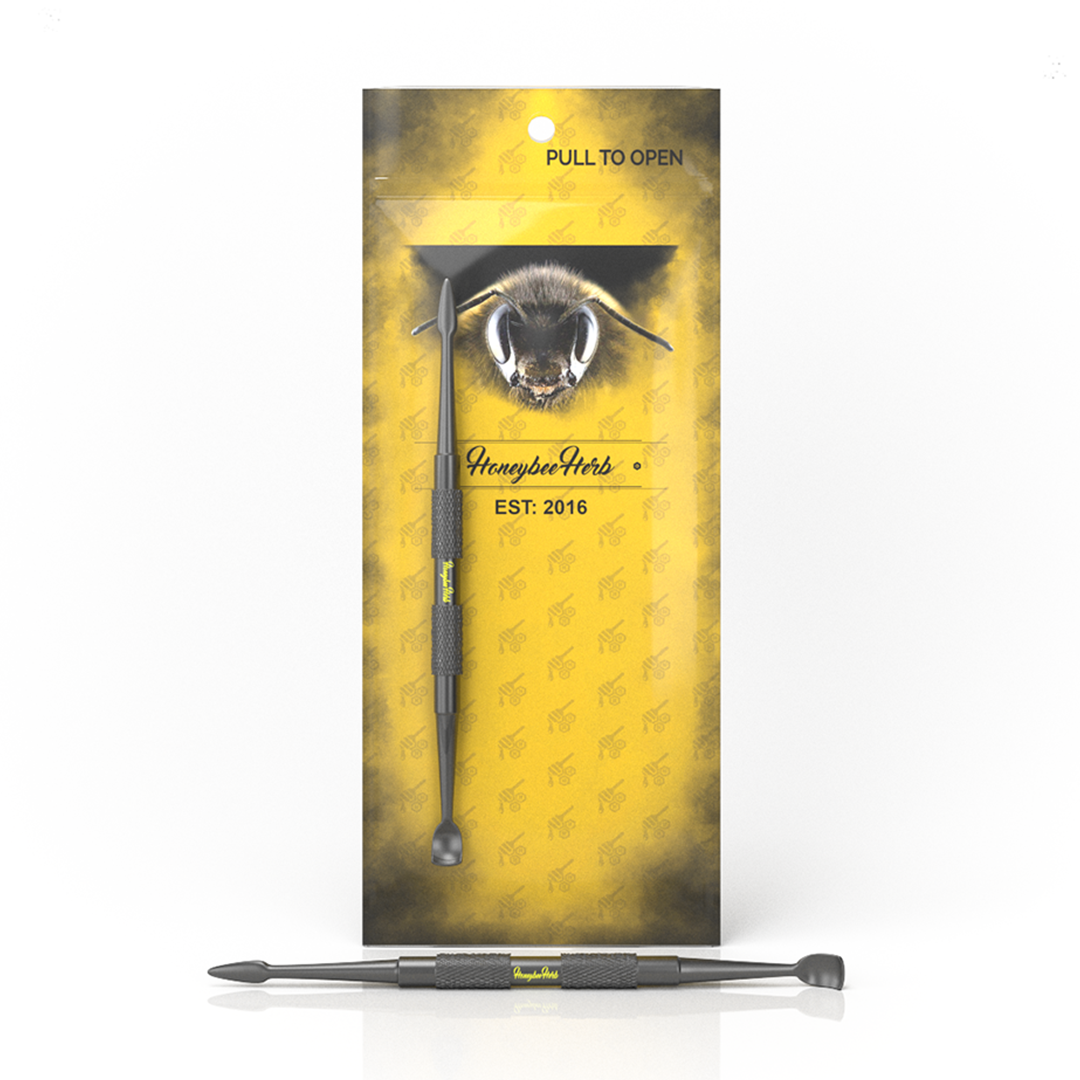 Honeybee Herb Stainless Dab Tool with textured grip and dual-ended design, packaging view