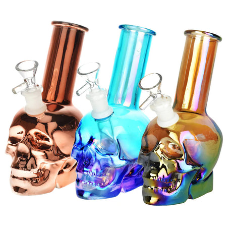 Array of Metallic Sunset Skull Water Pipes in iridescent colors for dry herbs, 7.5" height, front view