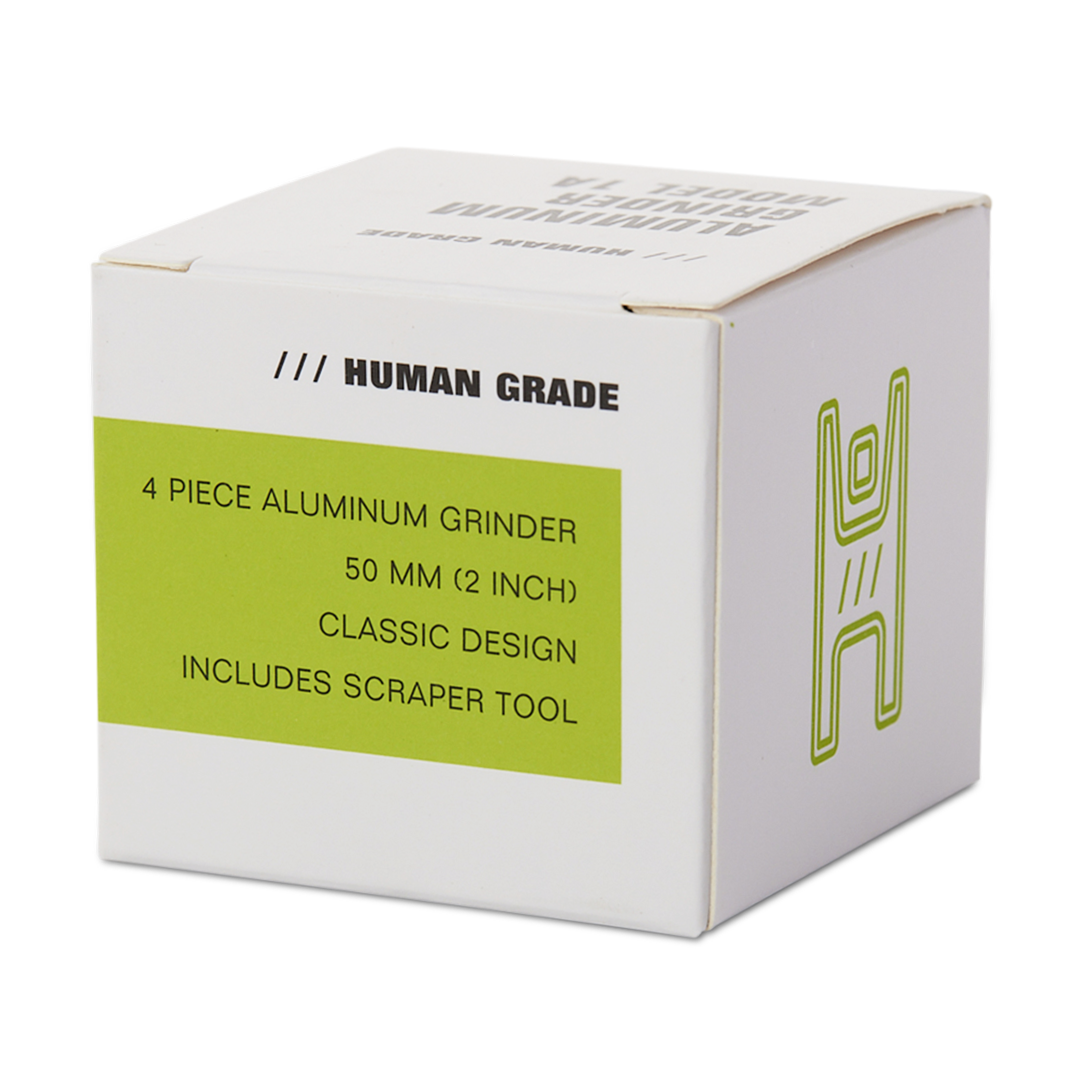 Human Grade 4-Piece Aluminum Grinder packaging box with product details on white background