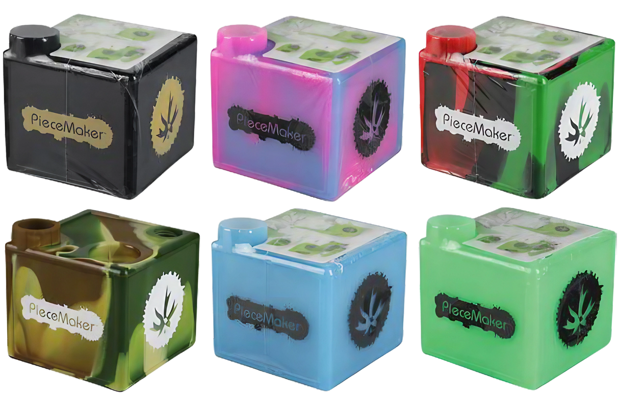 Assorted colors of Piecemaker Kube Silicone Cube Dab Rigs with 90-degree joints on display