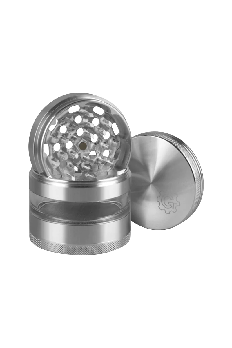 Pulsar 2.5" Aluminum 4pc Grinder with transparent stash window, showcasing sharp teeth and textured grip.