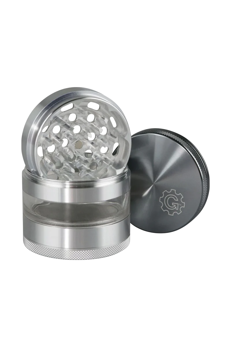 Pulsar 2.5" Aluminum 4pc Grinder with transparent stash window, showcasing sharp teeth and compact design.