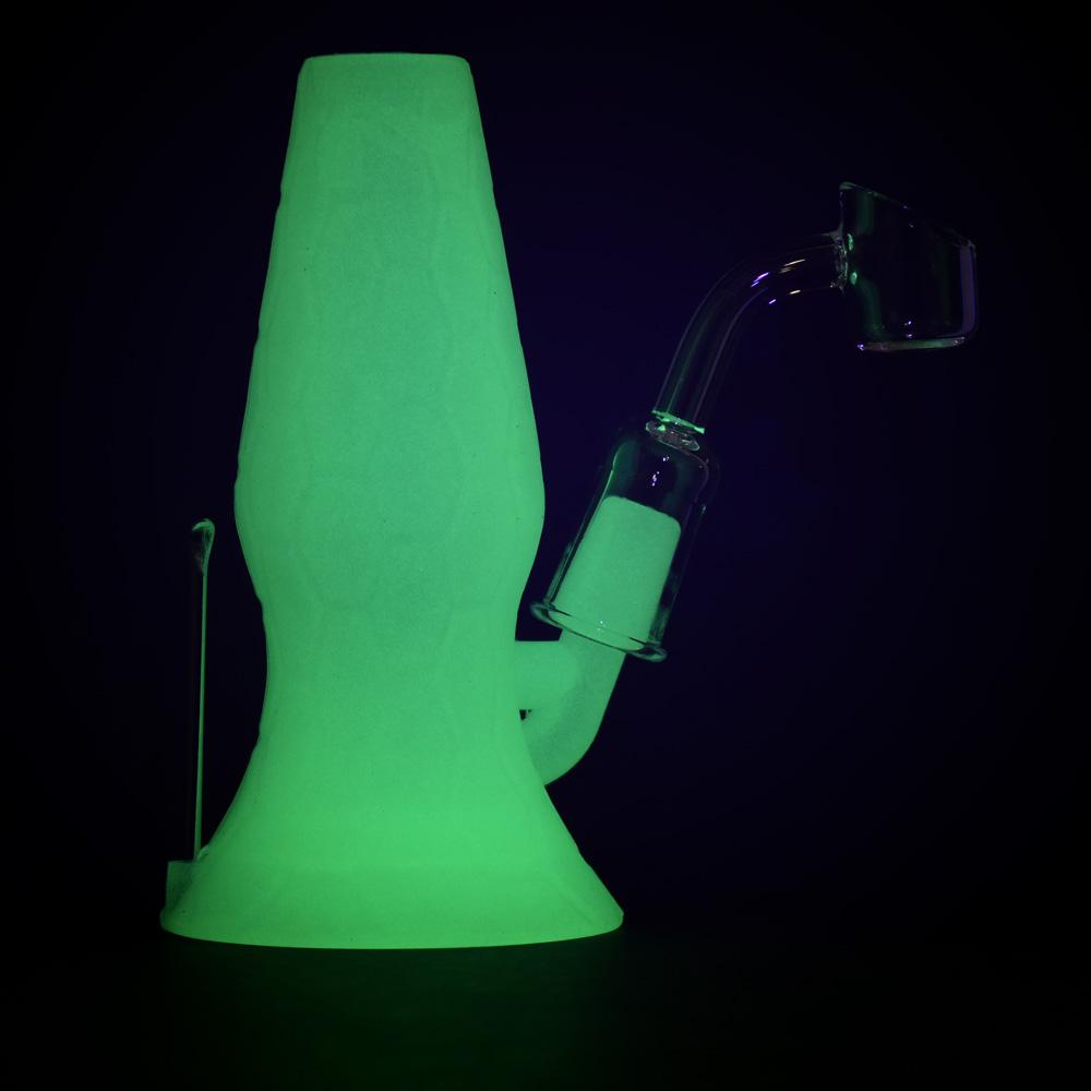 Pulsar RIP Series Mini Lava Flow Dual Rig glowing in dark, side view, 4.5" 14mm joint