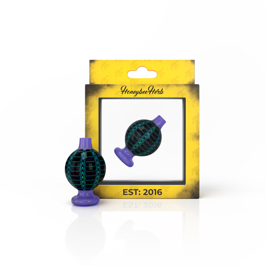 Honeybee Herb Dream Bubble Carb Cap in Purple with Grid Design for Dab Rigs, Front View on Packaging