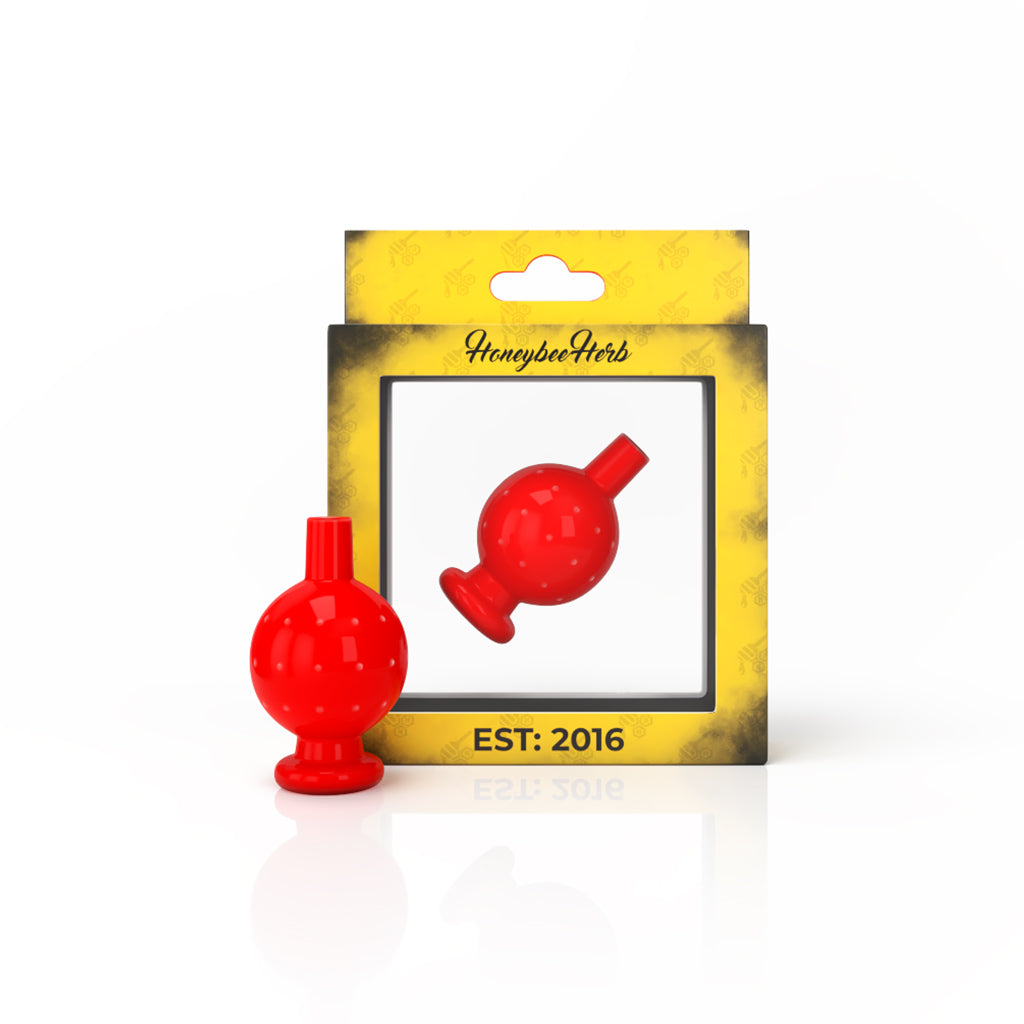 Honeybee Herb NEON BUBBLE CARB CAP in red for dab rigs, front view on branded packaging