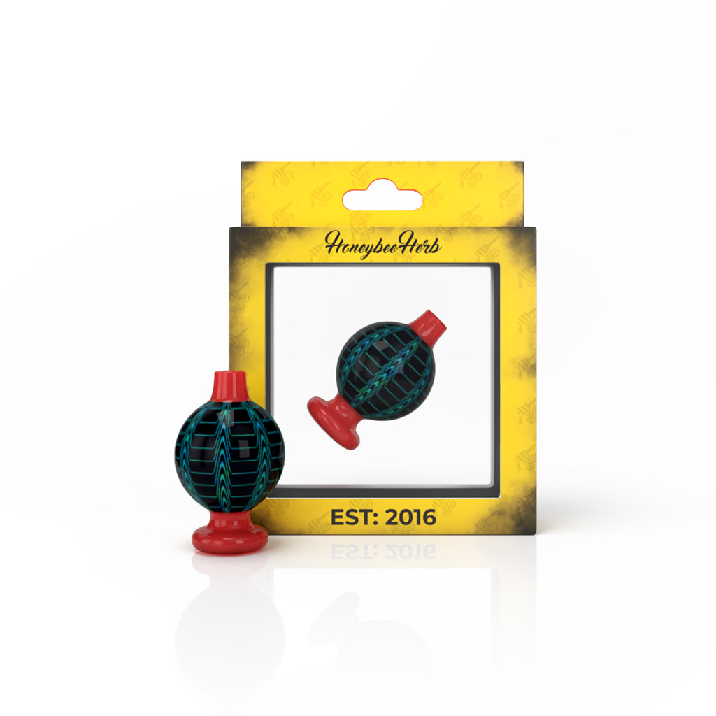 Honeybee Herb Dream Bubble Carb Cap in Red for Dab Rigs, Front View on Branded Packaging