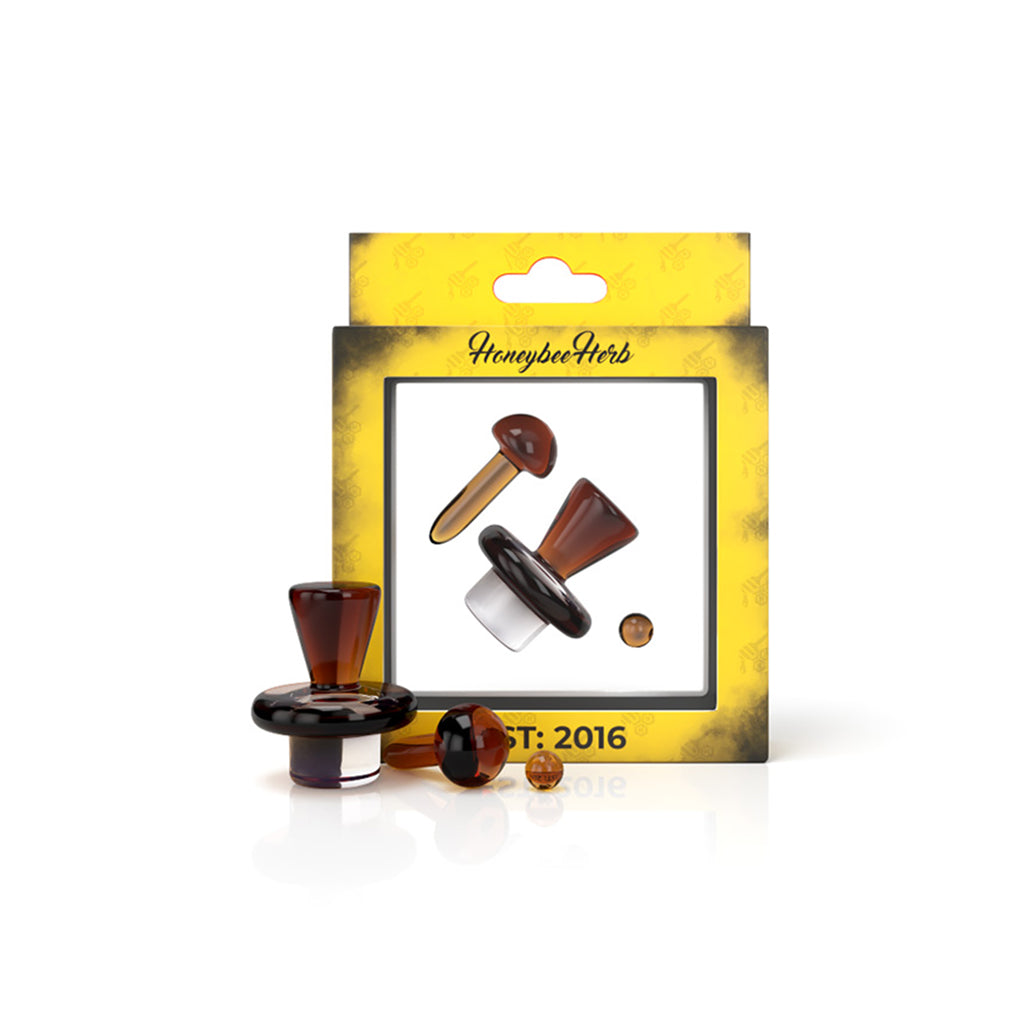 Honeybee Herb Pristine Terp Slurper Set with amber glass accessories on display