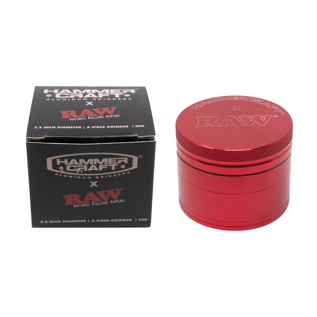 RAW x Hammercraft 2.2" Black/Red Compact Herb Grinder with Pollen Catcher beside its box