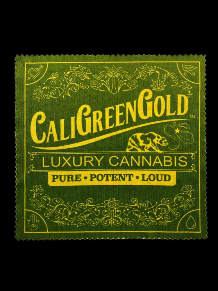 CaliGreenGold Luxury Cannabis Rolling Paper on Seamless Black Background