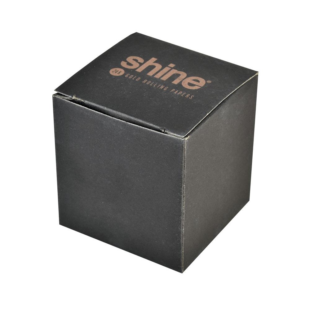 Shine Gold Herb Grinder packaging box on a seamless white background