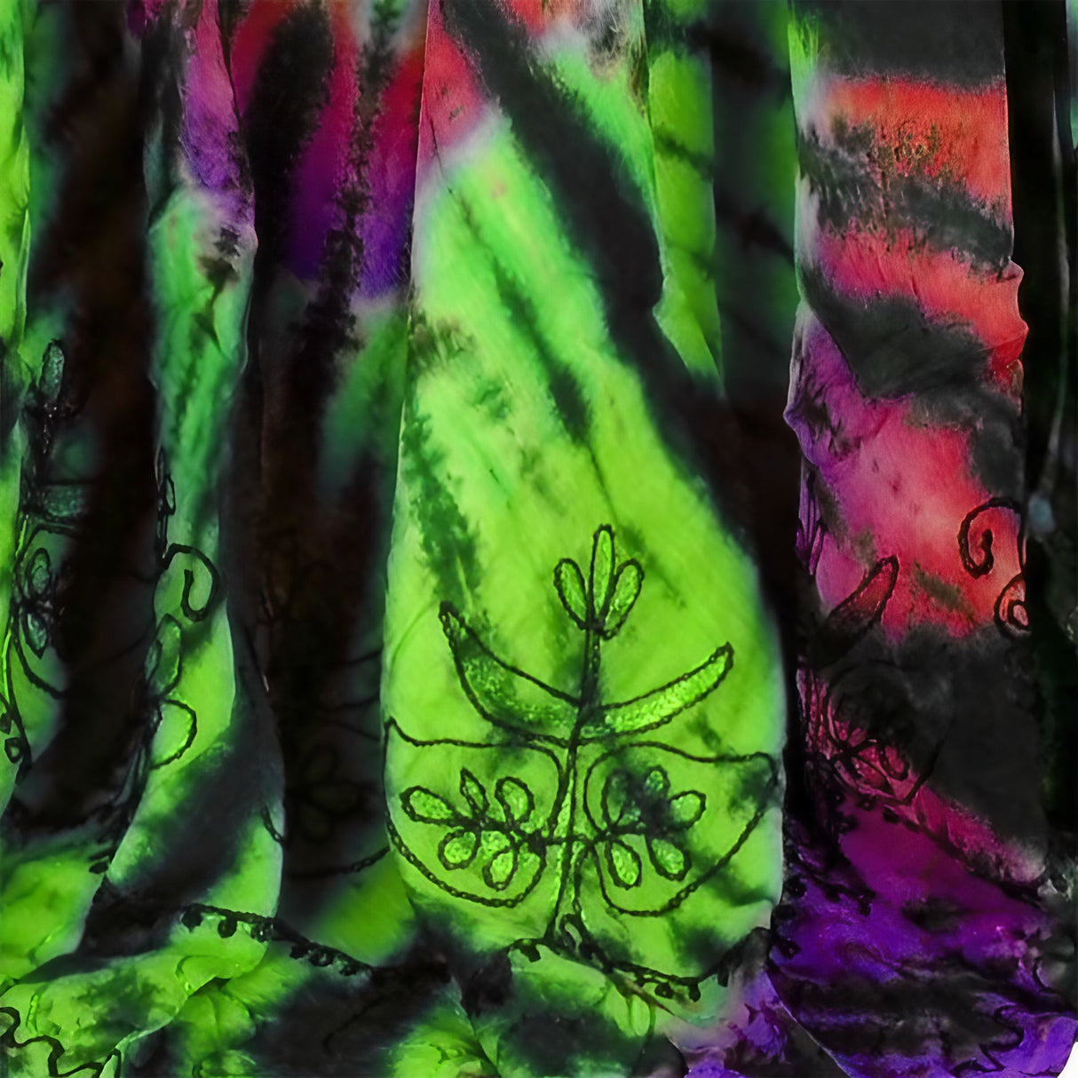 Close-up of Spiral Tie Dye Dress showcasing vibrant color pattern and unique design, one size fits all.