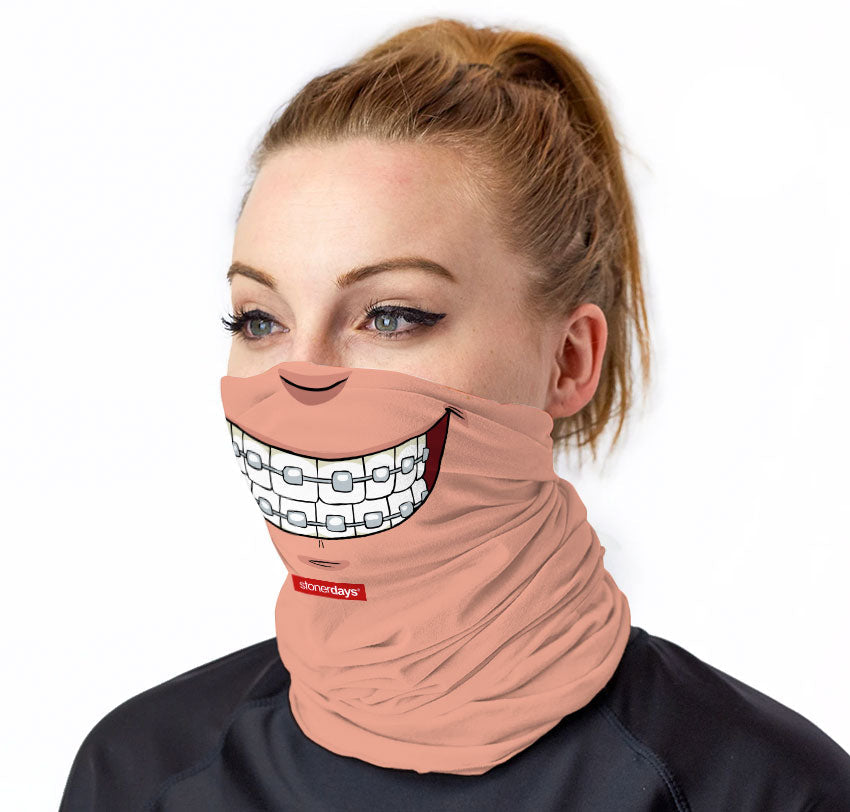 StonerDays Braces Smiley Neck Gaiter in beige, front view on model, versatile & comfy polyester