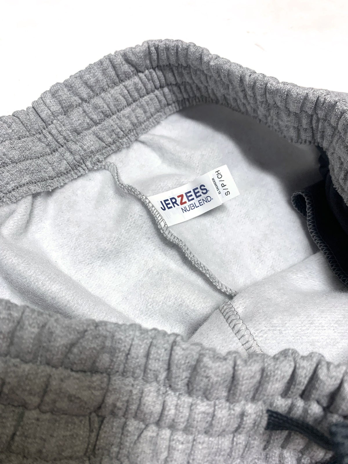 Close-up of StonerDays Mls All-stars Four20 Grey Jogger waistband with JERZEES label