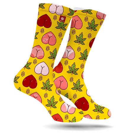 StonerDays Peaches & Cream Weed Socks with vibrant yellow background and cannabis leaf design
