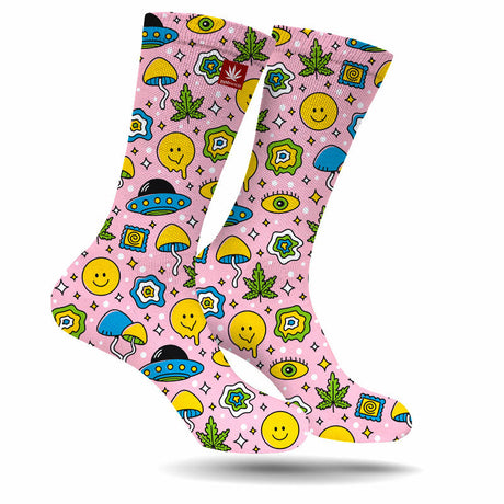 StonerDays Stay Weird Weed Socks with colorful cannabis and smiley face design on pink background, size M-XL