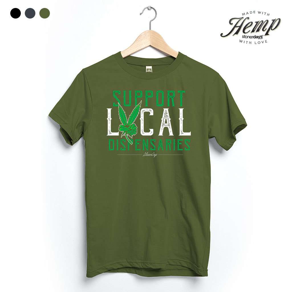 StonerDays Support Local Dispensaries green hemp tee displayed on hanger
