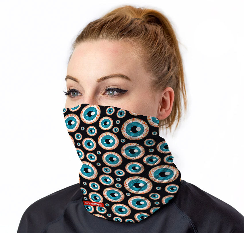 StonerDays Third Eye Pattern Neck Gaiter worn by model, front view, psychedelic eye design