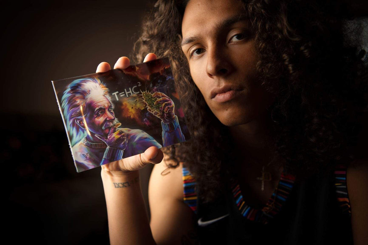 Person holding V Syndicate T=HC2 Black Hole Glass Rollin' Tray with cosmic design