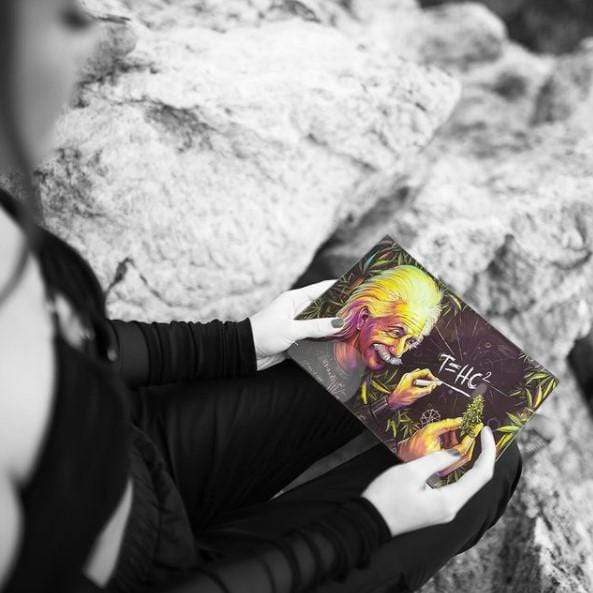 Person holding V Syndicate T=HC2 Glass Rollin' Tray with Einstein design, compact and portable