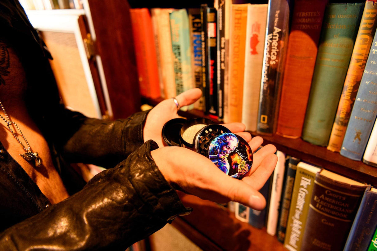 V Syndicate T=HC2 Black Hole 4-Piece Grinder in hand, compact and portable design