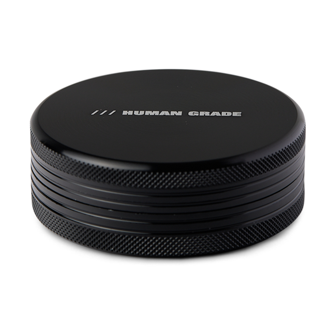 Human Grade Grinder 1C in Black, 2.5" 2-Piece, Front View on Seamless White Background
