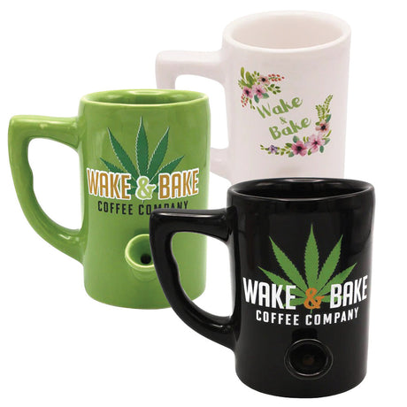 Wake & Bake Coffee Mug Pipes in green, white, and black with cannabis leaf design, 10oz - front view