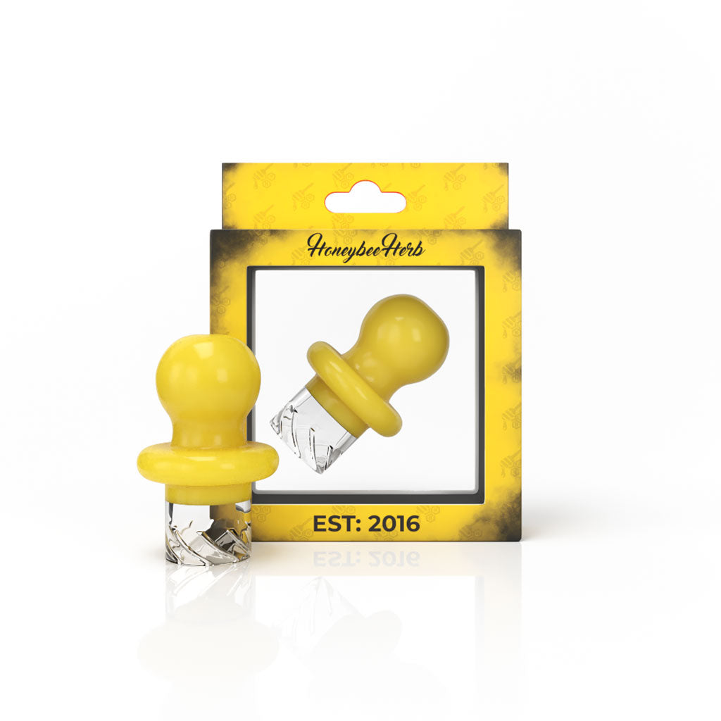 Honeybee Herb Yellow Button Top Vortex Carb Cap for Dab Rigs, Front View on Branded Packaging