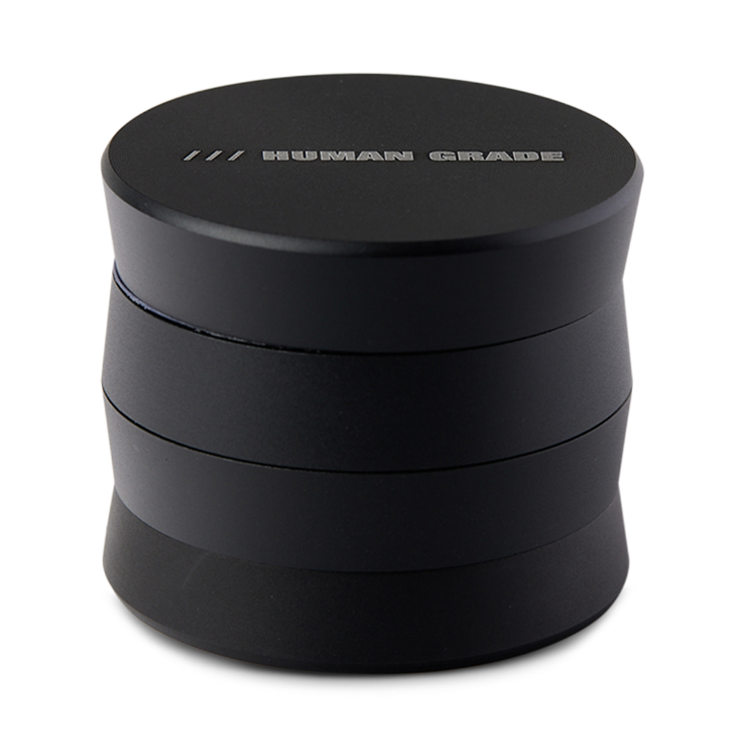 Human Grade Grinder 3A Black 2" 4-Piece, Front View on Seamless White Background