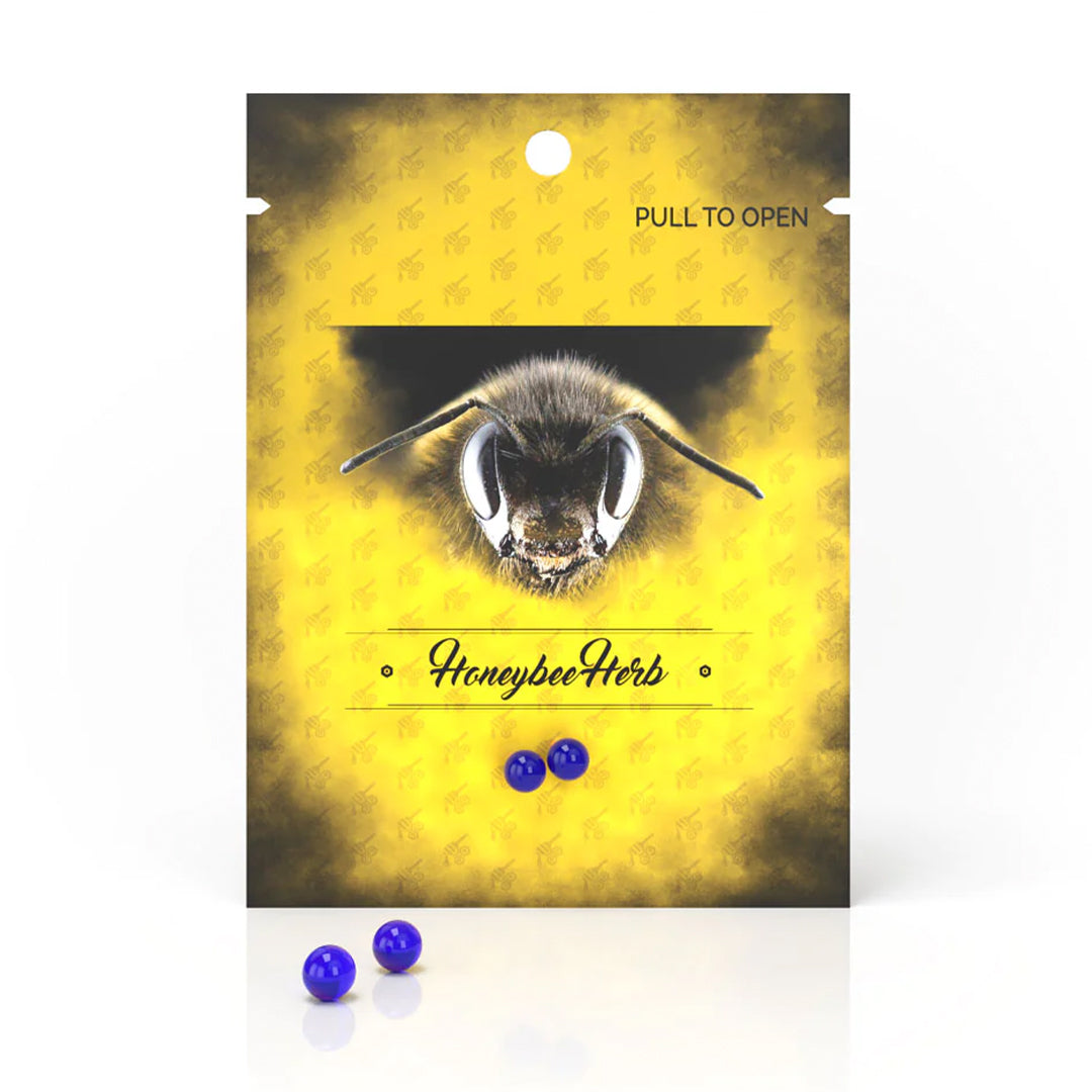 Honeybee Herb Terp Pearls in Sapphire Blue - 6mm variant, front view on branded package