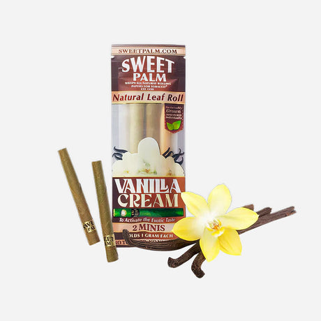 Flavored papers in a brown and cream package. Two mini leaf rolls are shown outside the pack. A yellow vanilla flower and vanilla beans highlight the smooth, creamy flavor.