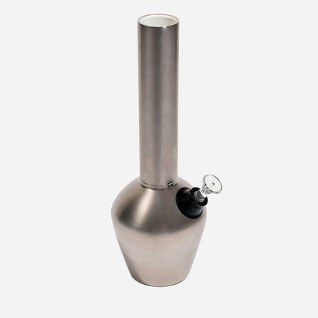 Metal bong with a smooth, metallic finish and a cylindrical neck. It has a rounded base and a glass bowl,