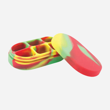 A compact silicone storage container for oils and waxes. It has a colorful red, yellow, and green swirl design, a secure lid, and multiple small compartments inside to keep different concentrates separated.