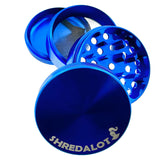 Sir Shredalot 4-Part Grinder 63mm in blue, disassembled view showing all parts and sharp teeth