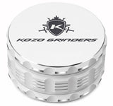 Kozo 4 inch four-piece non-stick aluminum grinder in white, closed front view with the Kozo logo on the lid