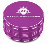 Kozo 3.5 inch ceramic non-stick aluminum grinder in purple, closed front view with the Kozo logo on the lid